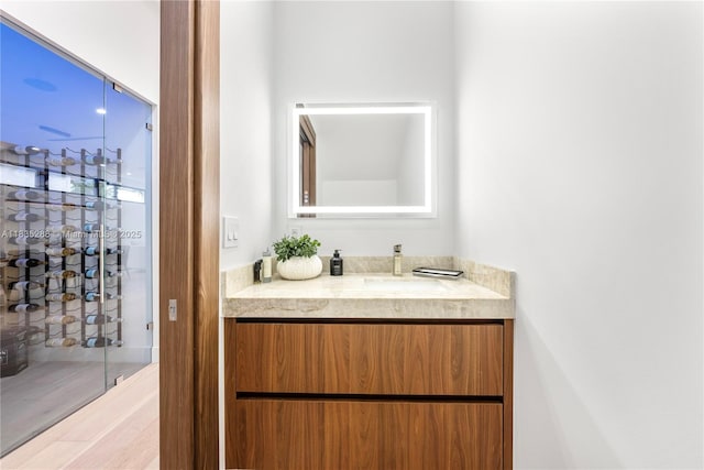 260 NW 47th St, Miami, FL 33127 - bathroom featuring vanity and a shower with shower door