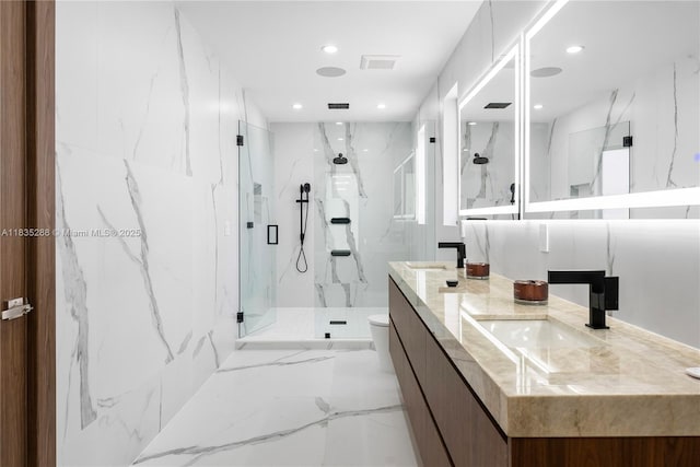 260 NW 47th St, Miami, FL 33127 - bathroom featuring double vanity, a marble finish shower, recessed lighting, and marble tiled flooring