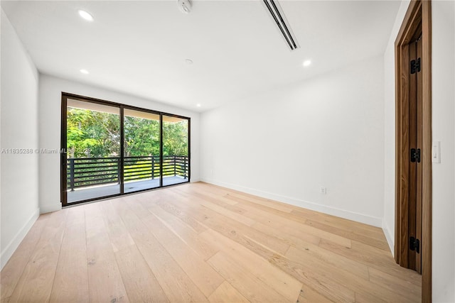 260 NW 47th St, Miami, FL 33127 - unfurnished room with a smoke detector, light wood finished floors, and recessed lighting