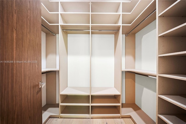 260 NW 47th St, Miami, FL 33127 - walk in closet with wood finished floors