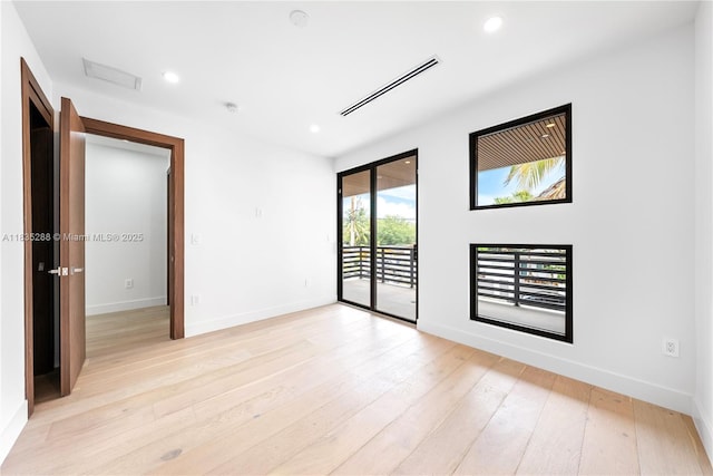 260 NW 47th St, Miami, FL 33127 - spare room with light wood finished floors and recessed lighting