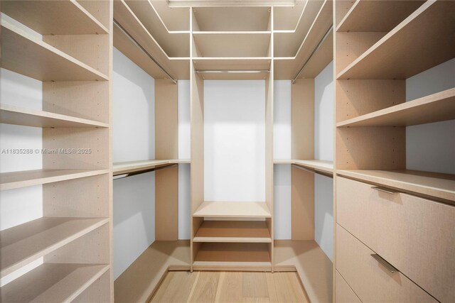 260 NW 47th St, Miami, FL 33127 - spacious closet featuring light wood-style flooring