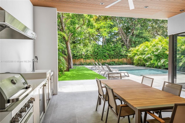 260 NW 47th St, Miami, FL 33127 - fenced backyard featuring outdoor dining space, area for grilling, and a patio