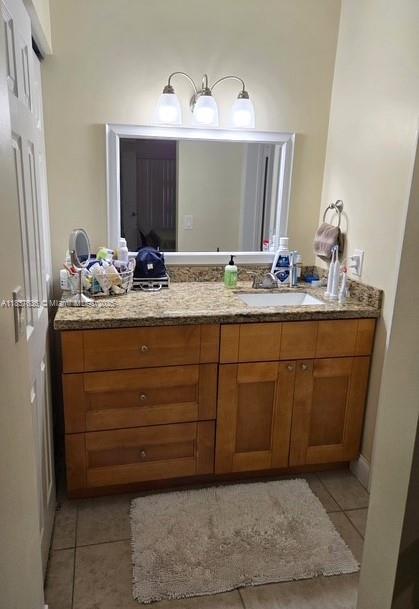 3817 Cocoplum Cir Unit 3585, Coconut Creek, FL 33063 - bathroom with tile patterned floors and vanity