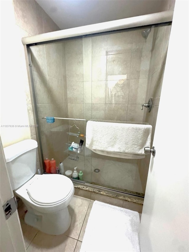 3817 Cocoplum Cir Unit 3585, Coconut Creek, FL 33063 - full bathroom featuring tile patterned flooring and tiled shower
