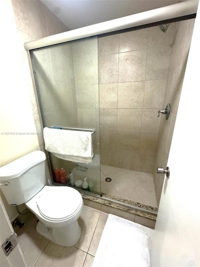 3817 Cocoplum Cir Unit 3585, Coconut Creek, FL 33063 - bathroom featuring tile patterned floors and a stall shower