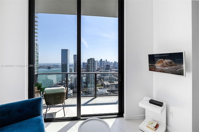 501 NE 31st St Unit 4007, Miami, FL 33137 - bedroom featuring a skyline view, multiple windows, and tile patterned floors
