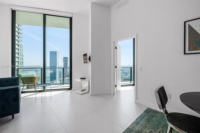 501 NE 31st St Unit 4007, Miami, FL 33137 - office featuring tile patterned flooring, a wall of windows, and a view of city