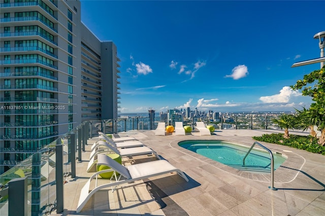 501 NE 31st St Unit 4007, Miami, FL 33137 - view of swimming pool with a city view, a community hot tub, and a patio area