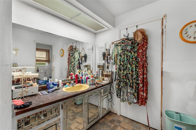 17041 Tarpon Way, Fort Myers, FL 33917 - bathroom with a sink and stone finish floors