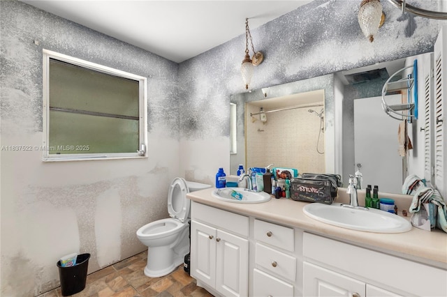 17041 Tarpon Way, Fort Myers, FL 33917 - bathroom with double vanity, a shower, and stone finish floors
