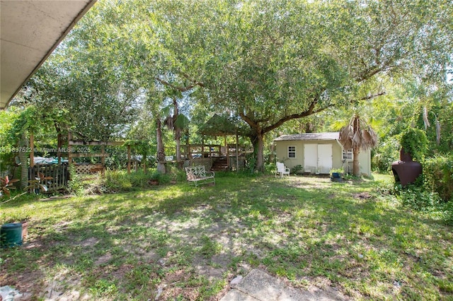 17041 Tarpon Way, Fort Myers, FL 33917 - view of yard featuring a shed