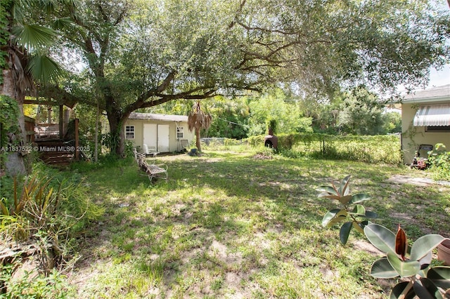 17041 Tarpon Way, Fort Myers, FL 33917 - view of yard with a storage unit