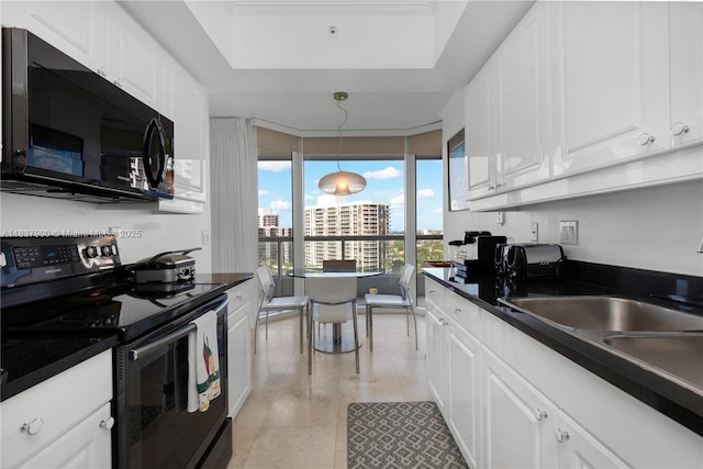 21055 Yacht Club Dr Unit 1504, Aventura, FL 33180 - kitchen featuring black appliances, dark countertops, white cabinets, a view of city, and light tile patterned floors