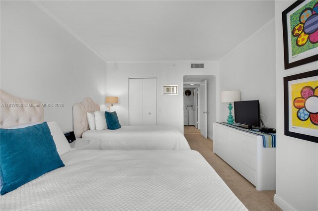 21055 Yacht Club Dr Unit 1504, Aventura, FL 33180 - bedroom featuring crown molding and light colored carpet