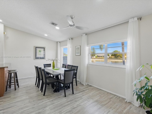 4024 Summer Chase Ct, Lake Worth, FL 33467 - dining area featuring ceiling fan, light wood-style floors, a water view, and recessed lighting
