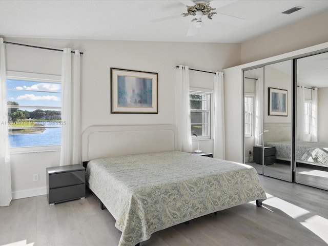 4024 Summer Chase Ct, Lake Worth, FL 33467 - bedroom featuring wood finished floors, vaulted ceiling, a closet, and a ceiling fan