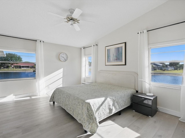 4024 Summer Chase Ct, Lake Worth, FL 33467 - bedroom with wood finished floors, vaulted ceiling, and a ceiling fan