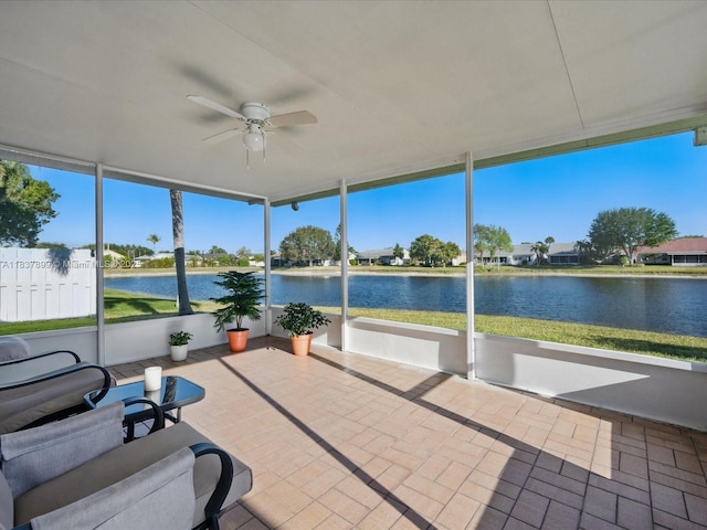 4024 Summer Chase Ct, Lake Worth, FL 33467 - unfurnished sunroom featuring ceiling fan, a water view, and plenty of natural light
