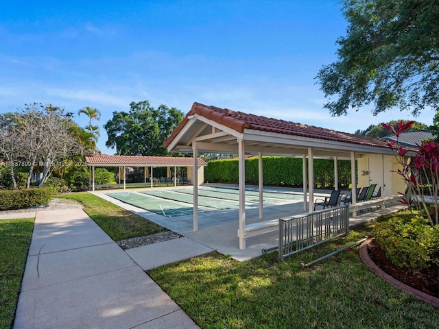 4024 Summer Chase Ct, Lake Worth, FL 33467 - surrounding community featuring shuffleboard and a yard