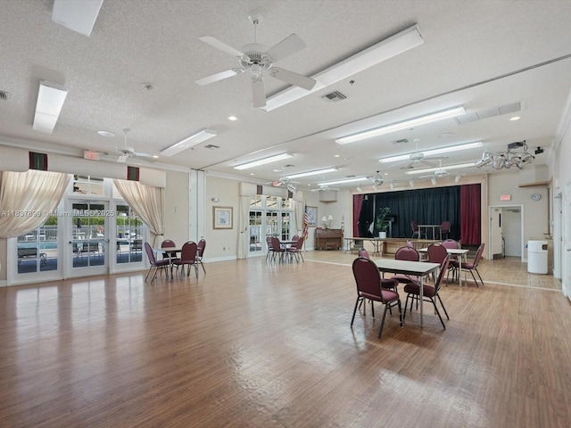 4024 Summer Chase Ct, Lake Worth, FL 33467 - dining area featuring ceiling fan, wood finished floors, and a textured ceiling
