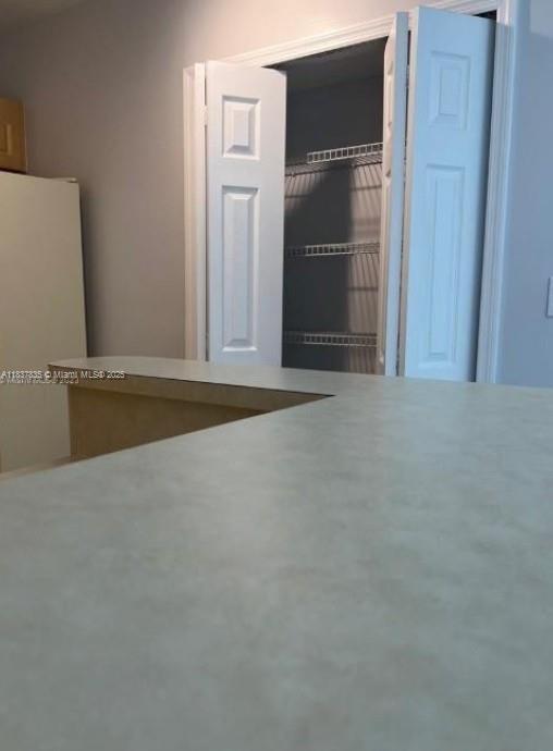 3395 NE 9th St Unit 104, Homestead, FL 33033 - detailed view of freestanding refrigerator