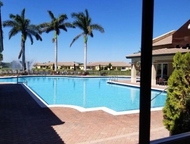 3395 NE 9th St Unit 104, Homestead, FL 33033 - community pool with a patio