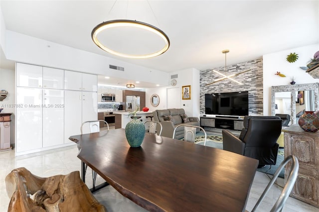 1010 SW 2nd Ave Unit Lph04, Miami, FL 33130 - dining area with light marble finish floors