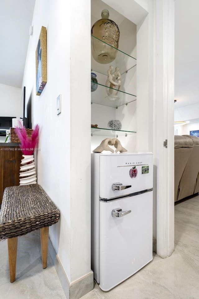 1010 SW 2nd Ave Unit Lph04, Miami, FL 33130 - bar featuring freestanding refrigerator and concrete flooring