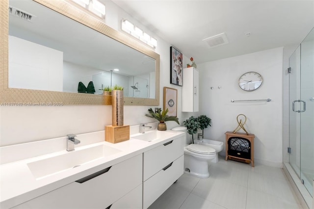1010 SW 2nd Ave Unit Lph04, Miami, FL 33130 - bathroom featuring a bidet, a shower stall, double vanity, and tile patterned flooring