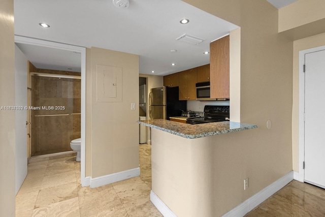 770 Claughton Island Dr Unit Ph21, Miami, FL 33131 - kitchen with black electric range, stainless steel microwave, recessed lighting, dark stone counters, and a peninsula