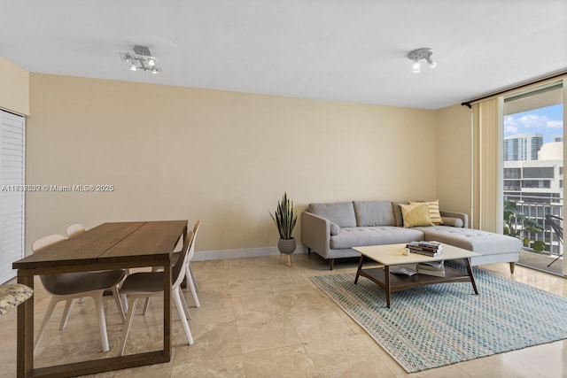 770 Claughton Island Dr Unit Ph21, Miami, FL 33131 - living area with baseboards and expansive windows