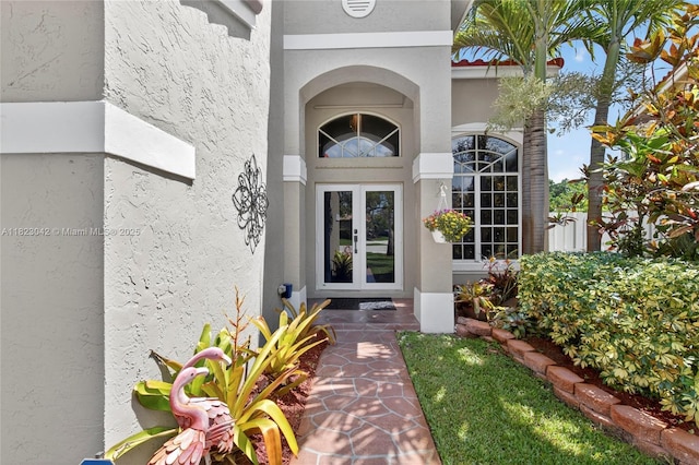 18205 NW 21st St, Pembroke Pines, FL 33029 - view of exterior entry with stucco siding and french doors