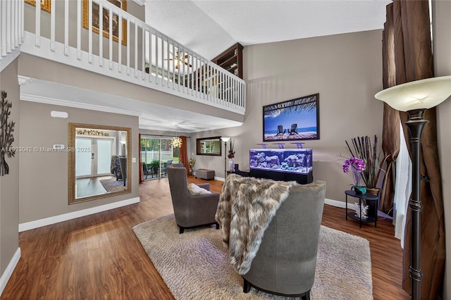 18205 NW 21st St, Pembroke Pines, FL 33029 - living area with wood finished floors and a towering ceiling
