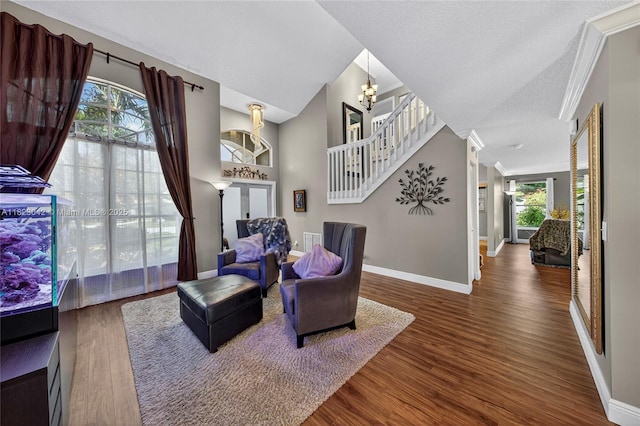 18205 NW 21st St, Pembroke Pines, FL 33029 - sitting room featuring wood finished floors and a chandelier
