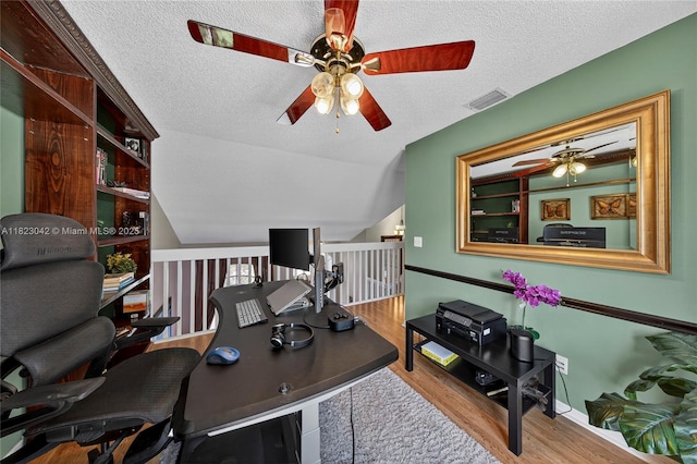18205 NW 21st St, Pembroke Pines, FL 33029 - home office with a ceiling fan, wood finished floors, and a textured ceiling