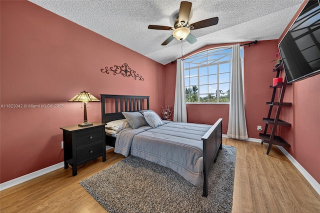 18205 NW 21st St, Pembroke Pines, FL 33029 - bedroom with lofted ceiling, wood finished floors, a textured ceiling, and ceiling fan