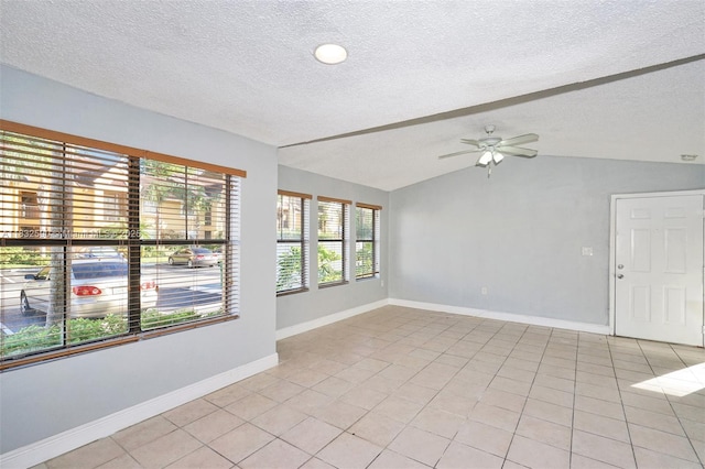15560 SW 104th Ter Unit 611, Miami, FL 33196 - empty room featuring lofted ceiling, a textured ceiling, a ceiling fan, and light tile patterned floors
