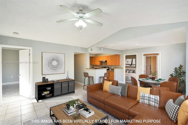 15560 SW 104th Ter Unit 611, Miami, FL 33196 - living room with vaulted ceiling, light tile patterned floors, and a ceiling fan
