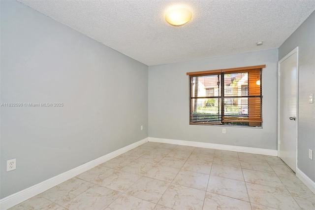 15560 SW 104th Ter Unit 611, Miami, FL 33196 - unfurnished room with marble finish floors and a textured ceiling