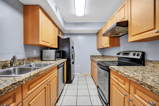 15560 SW 104th Ter Unit 611, Miami, FL 33196 - kitchen with stainless steel appliances, range hood, a textured ceiling, light countertops, and light tile patterned floors