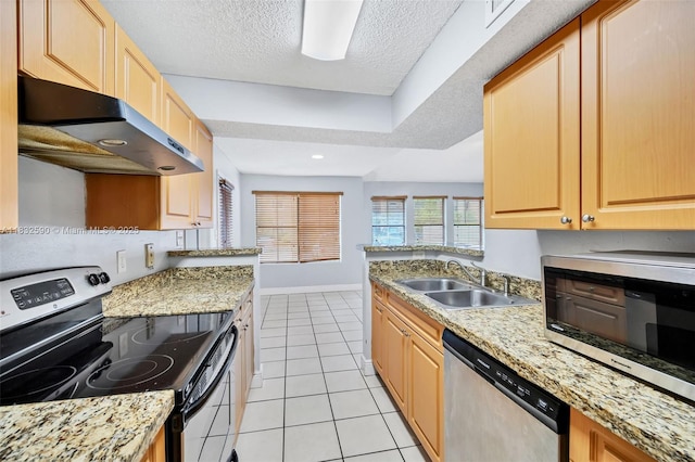 15560 SW 104th Ter Unit 611, Miami, FL 33196 - kitchen featuring appliances with stainless steel finishes, under cabinet range hood, light tile patterned floors, a textured ceiling, and light brown cabinetry
