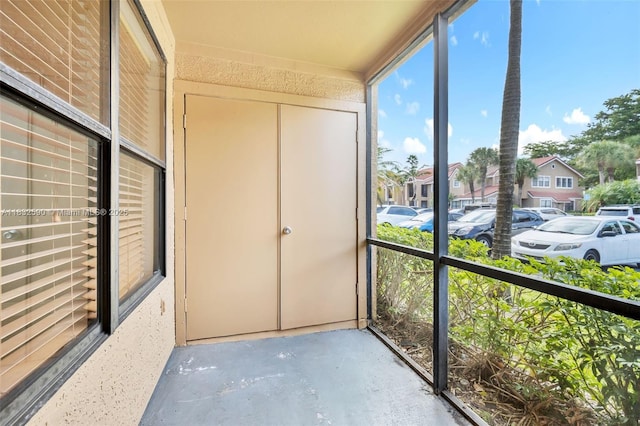 15560 SW 104th Ter Unit 611, Miami, FL 33196 - unfurnished sunroom featuring a residential view