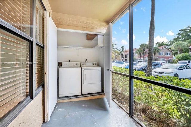 15560 SW 104th Ter Unit 611, Miami, FL 33196 - unfurnished sunroom featuring washer and dryer and a residential view