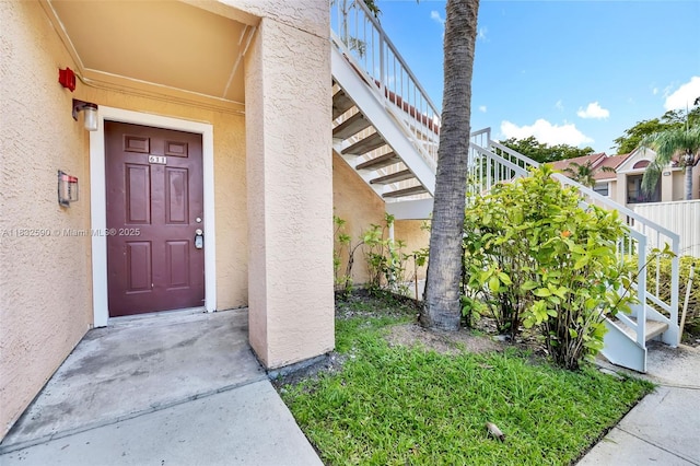 15560 SW 104th Ter Unit 611, Miami, FL 33196 - doorway to property with stucco siding