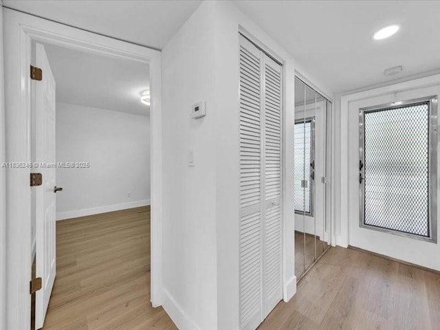 6000 NW 64th Ave Unit 303, Tamarac, FL 33319 - hallway with wood finished floors