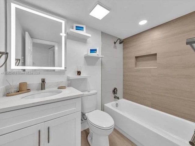6000 NW 64th Ave Unit 303, Tamarac, FL 33319 - bathroom with vanity, shower / bath combination, wood finished floors, and recessed lighting