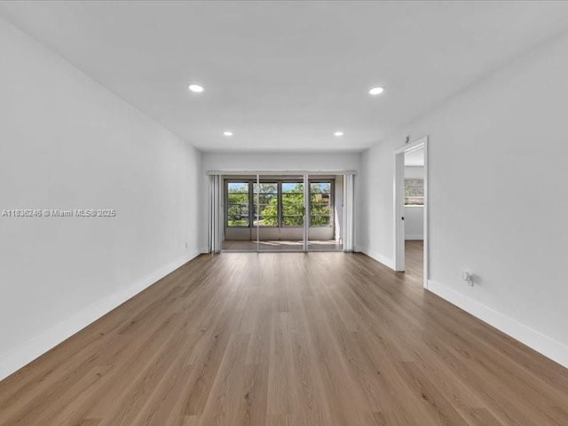 6000 NW 64th Ave Unit 303, Tamarac, FL 33319 - unfurnished room featuring recessed lighting and wood finished floors