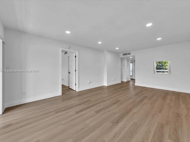 6000 NW 64th Ave Unit 303, Tamarac, FL 33319 - spare room with recessed lighting and light wood finished floors