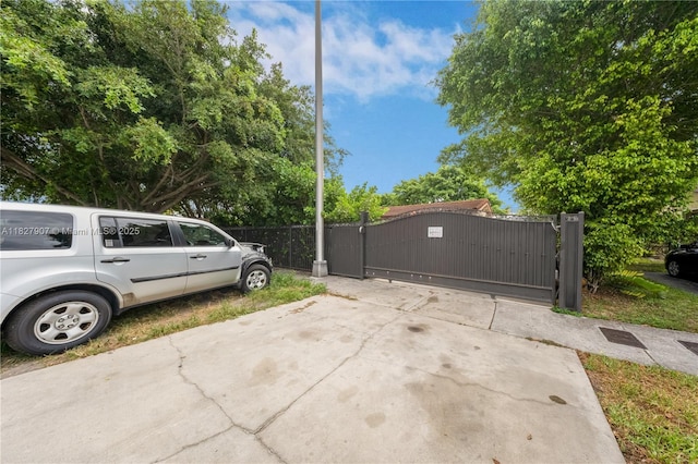 3631 SW 127th Ave, Miami, FL 33175 - view of parking with a gate